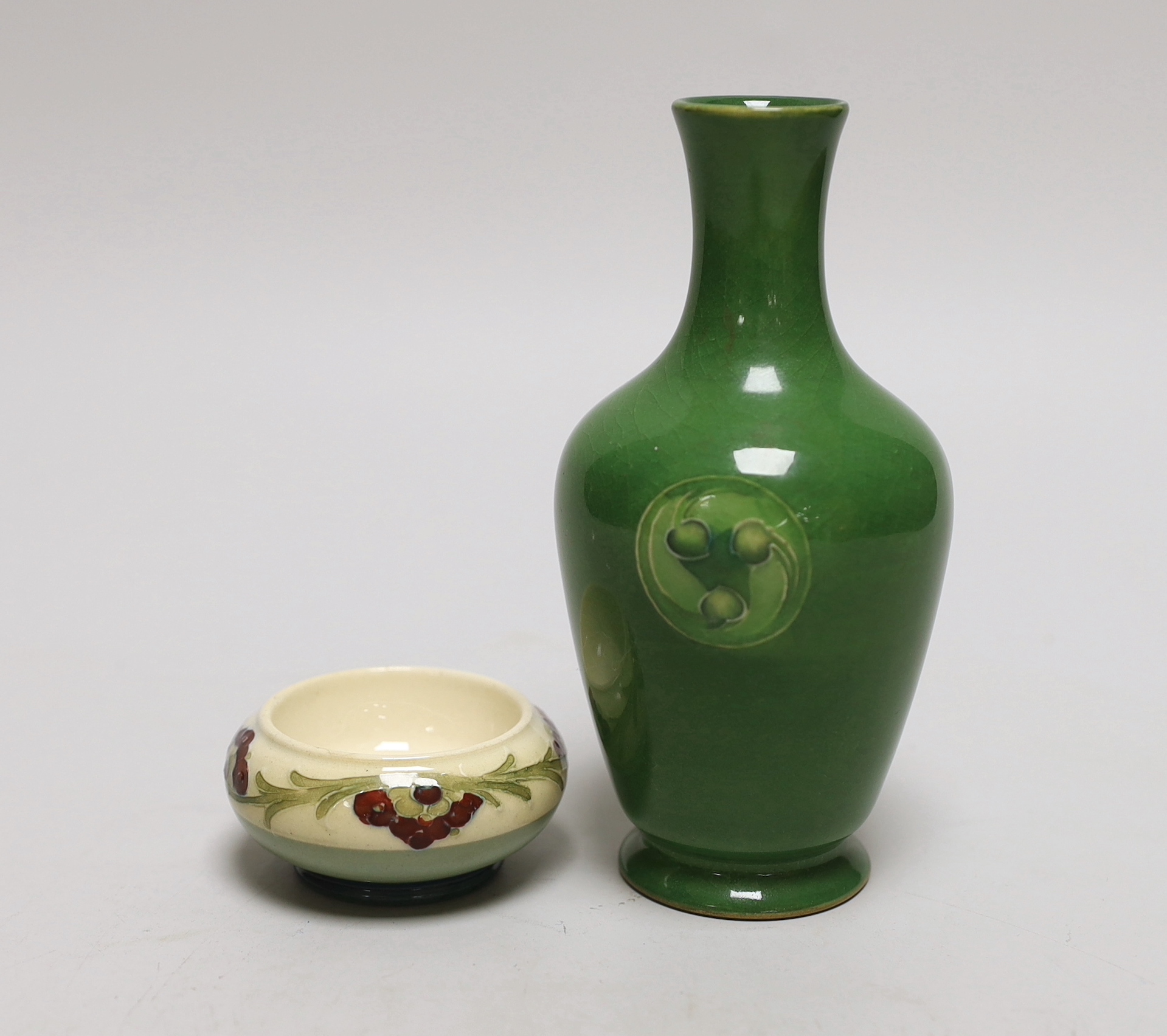 A Moorcroft for Liberty & Co. Flamminian ware green-glazed vase and a Mcintyre salt, tallest 13cm